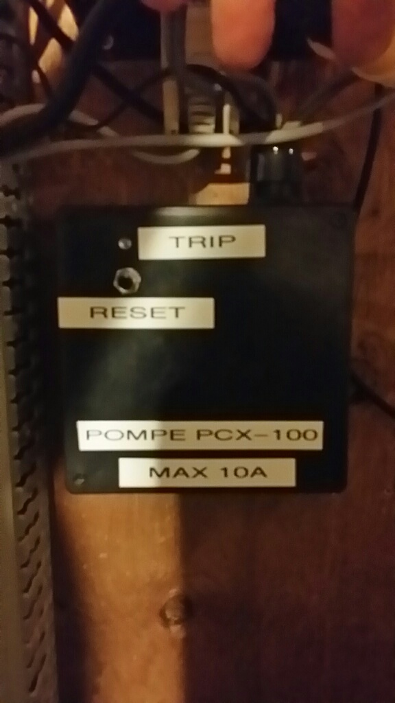 Box with relays to stop pump with reset button